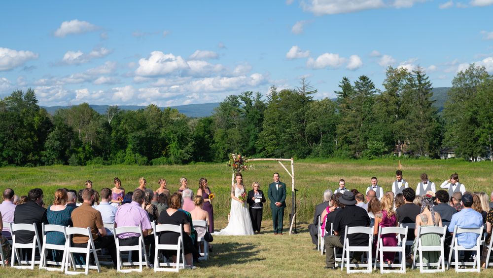Ceremony in field - Credit: Christina Michelle Photography