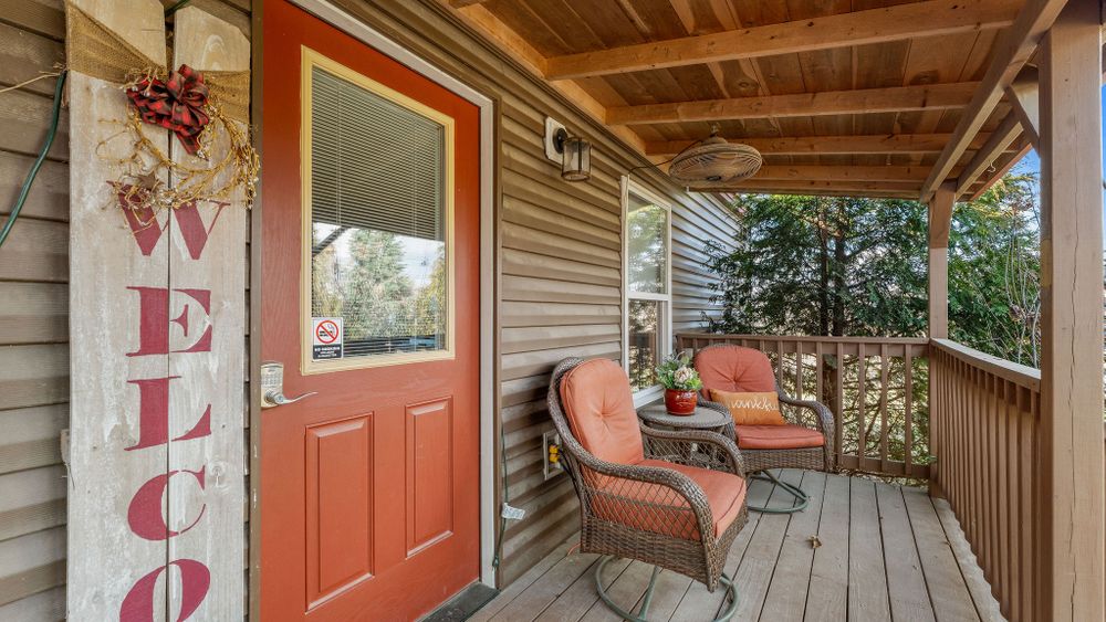 "Welcome to Your Cozy Retreat" 

Step onto the inviting porch of our charming cottage where comfort meets tranquility. Imagine sipping your morning coffee in one of these cozy chairs, surrounded by lush greenery and the serene sounds of nature.