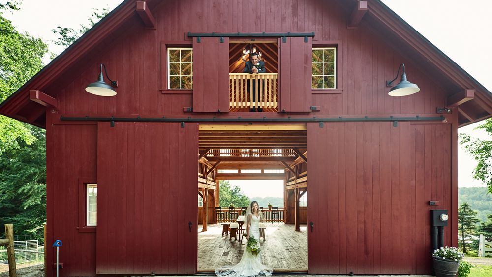 Cate Bligh- THE GREEN BARN WEDDING PHOTOGRAPHY- View from behind barn, looking through it as guests would enter